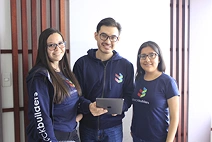Ecuador Office developers smiling at the camera