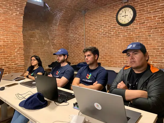 Spain Office employees paying attention to a presentation