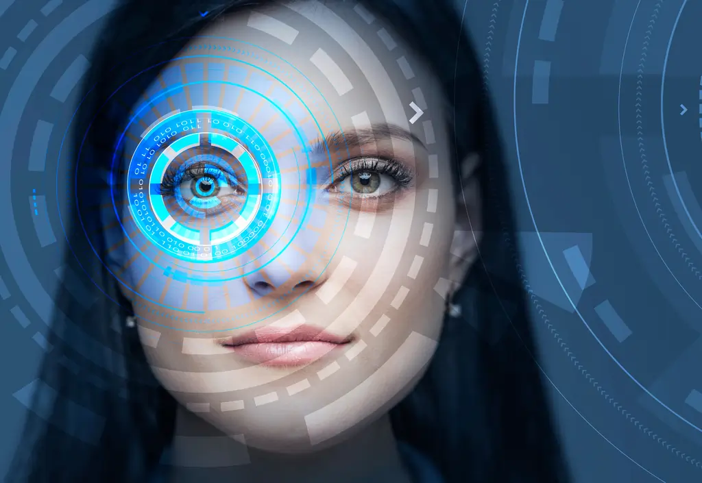 Young woman with colorful hud interface near her eye