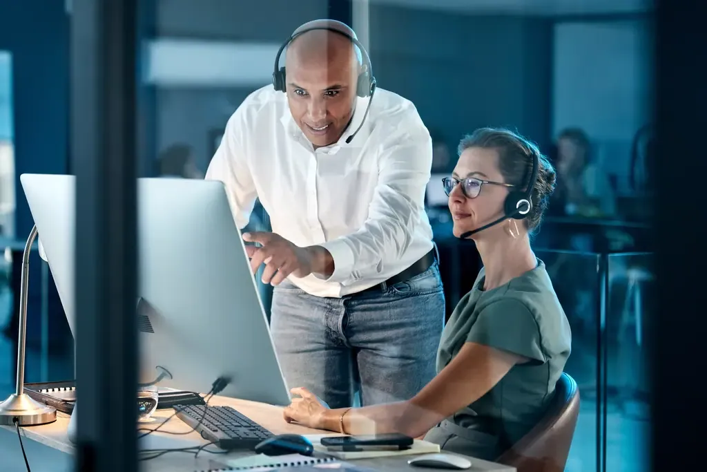 Worker coaching a teammate
