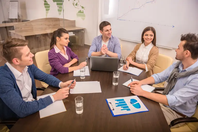 A group of business partners discussing a project