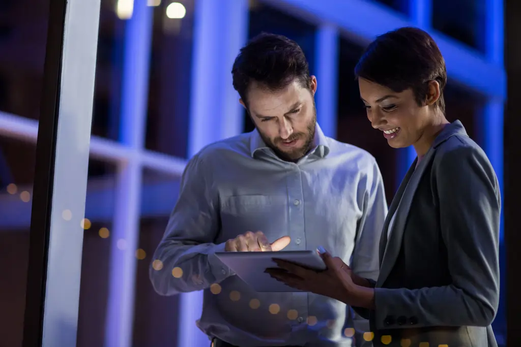Business people using a digital tablet